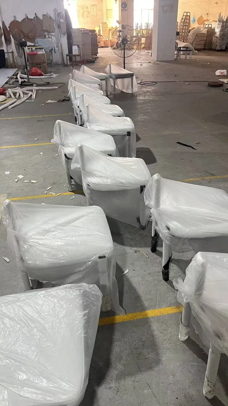 Chairs covered with protective wrapping
